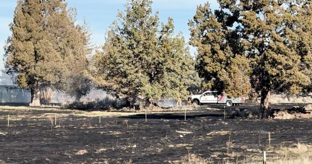 Wind-driven burn near Bend airport grows to nearly 7 acres