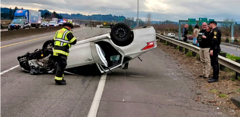 Driver going 125 mph flips over I-5 barrier during crash, police say