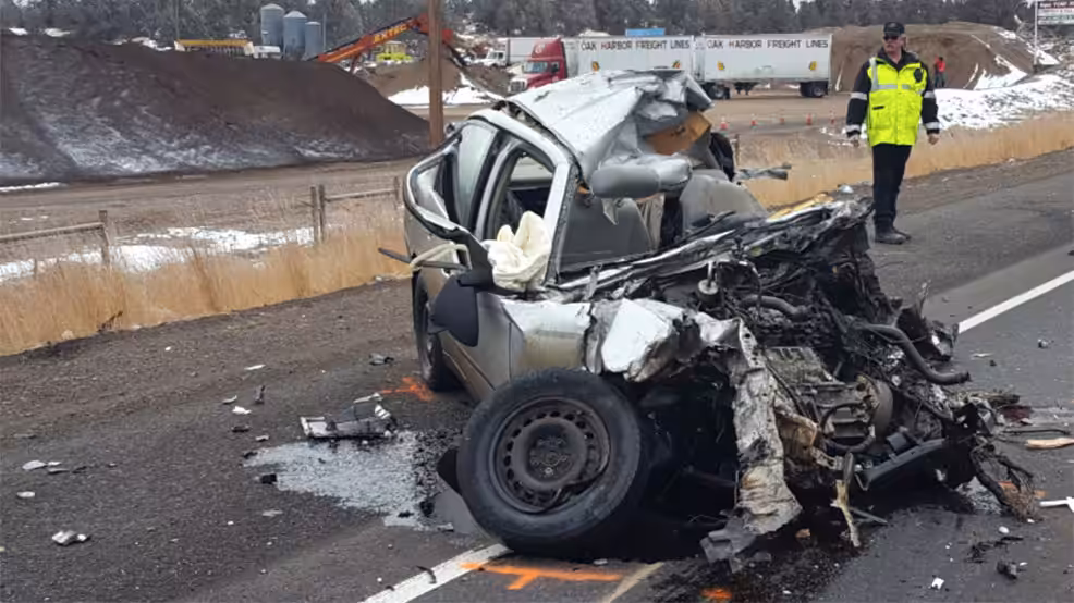 Woman dies after head-on collision with truck hauling forklift in Oregon