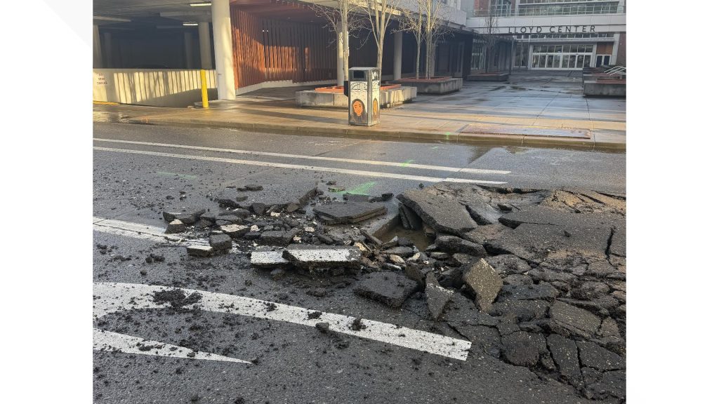 Water main break floods Northeast Multnomah Street, closes road in Portland’s Lloyd District
