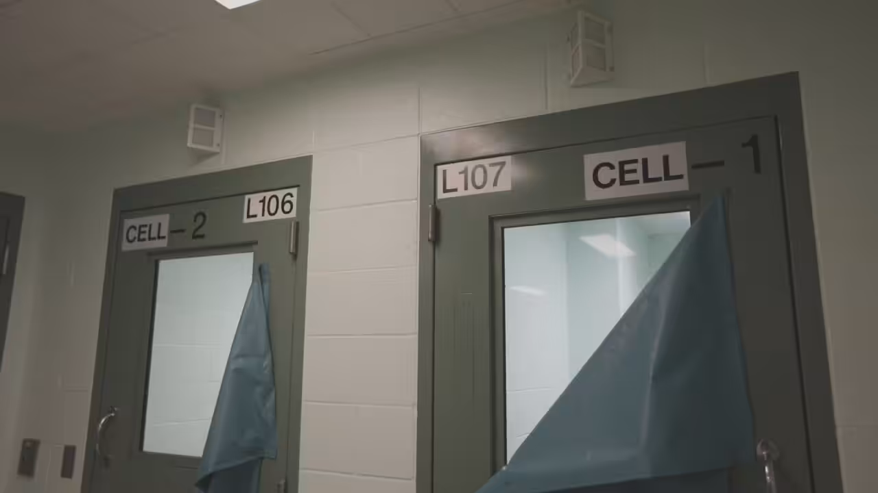 he entered her cell, asked her to hand over notes