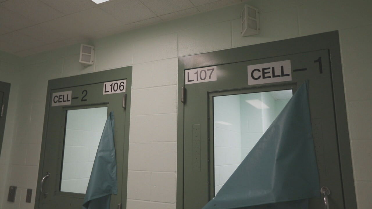 he entered her cell, asked her to hand over notes