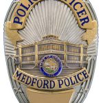 Medford Man Shot After Allegedly Attacking Apartment Door With Axe