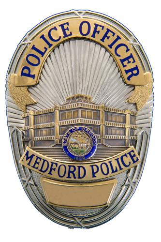 Medford Man Shot After Allegedly Attacking Apartment Door With Axe