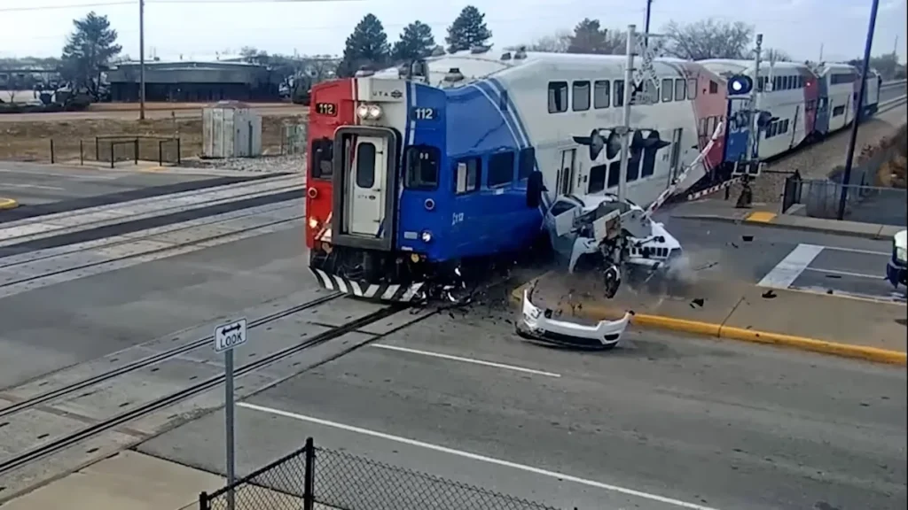 Train Obliterates SUV at Utah Railroad Crossing After Rear-End Collision Pushes It Onto the Tracks