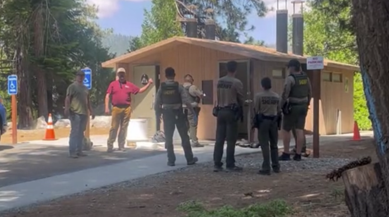 Camper falls into vault toilet at California campsite while Retrieving Dropped Sunglasses
